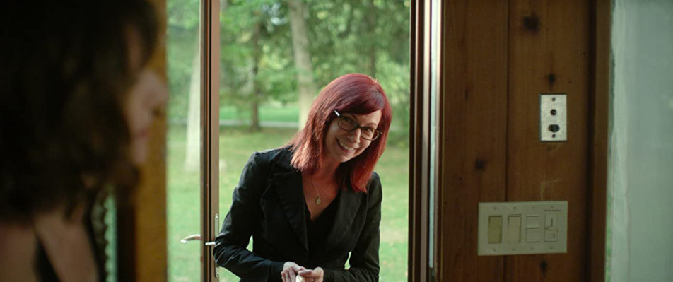 Carrie Preston plays Sylvia, the menacing and recently widowed hostess, of some of her husband's college friends in "30 Miles From Nowhere." (Photo courtesy IMDb.com)