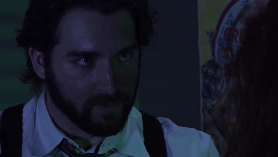Cash looks deep into the eyes of his lover Savanna. It doesn't last long. (Screen capture by reviewer Ben Nagy)