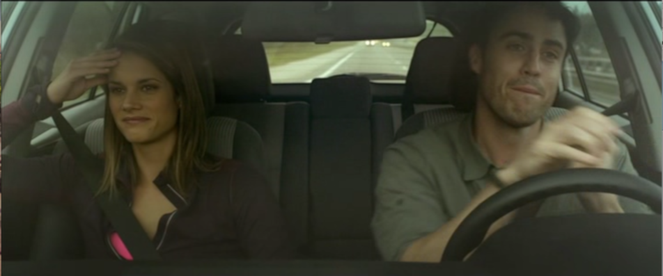 Jenn (Missy Peregrym) and Alex (Jeff Roop) are on the road headed toward "Backcountry." (Screen capture by reviewer Ben Nagy)