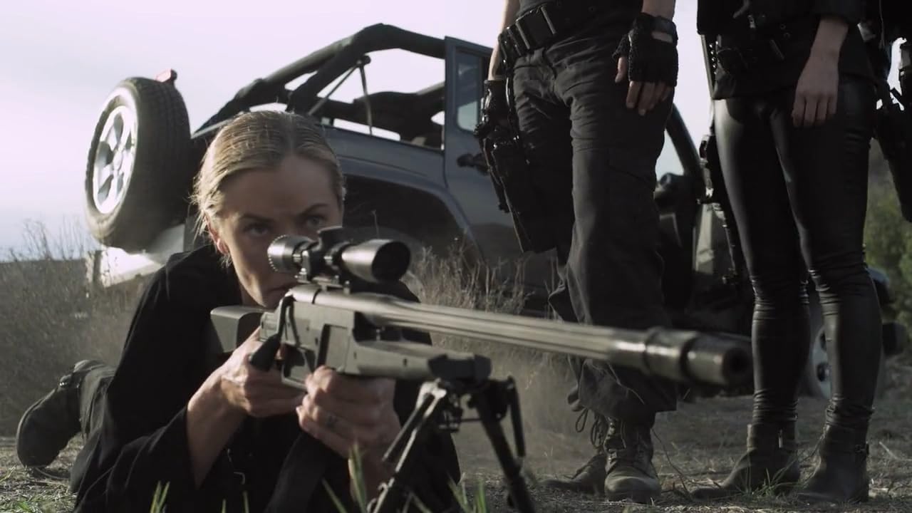 ‘Mercenaries’: Lady convicts forced to free president’s kid from the country of Borat 1 Kat (Kristanna Loken) gets to use her big gun in "Mercenaries." (Photo courtesy IMDb.com)