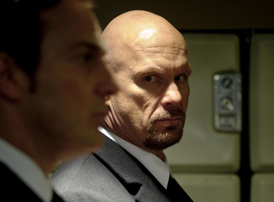 ‘The Package’: Stone Cold tries to deliver; Dolph pontificates on food 1 “Stone Cold” Steve Austin wears a suit and gives his partner some side eye in “The Package.” (Photo courtesy IMDb.com)