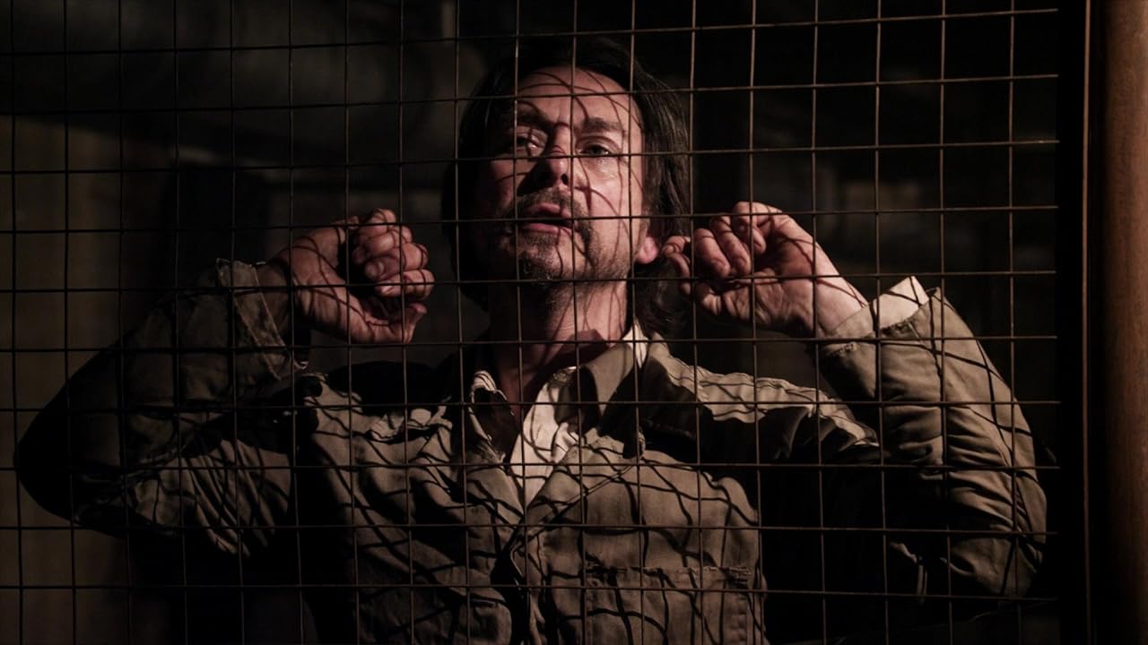 Psycho (Jeremy Crutchley) waxes philosophically while stashed in his chicken coop-style cell in "Death Race 3: Inferno." (Photo courtesy IMDb.com)